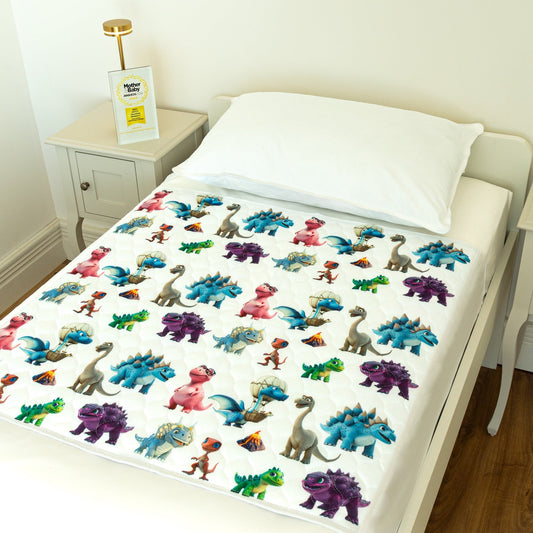 Bedwetz Dinosaur waterproof bed pad on a single bed with the Mother&Baby Awards 2026 Gold trophy